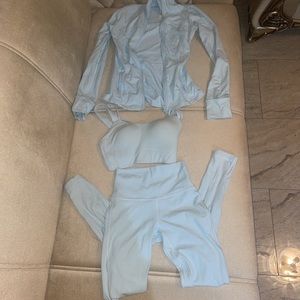 lululemon 3 piece set powder blue size 4; comes with sports bra, jacket, 28 inch